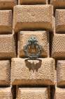 Albaicin, Andalusia, Spain. Bronze hitching loop shape of a lion on a stone wall in the Alhambra. Art Print